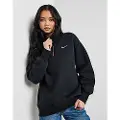 Nike Oversized Nike Sportswear Phoenix-sweatshirt med 1/4 lynlås og langt snit til kvinder - sort