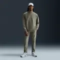 Nike 24.7 PerfectStretch Dri-FIT-chinobukser med slank pasform til mænd - grøn