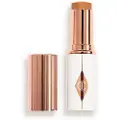 Charlotte Tilbury - Unreal Skin Sheer Glow Tint - Fugtgivende Foundation Stick - Unreal Skin Sheer Glow Tint - 12 - For Women
