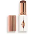 Charlotte Tilbury - Unreal Skin Sheer Glow Tint - Fugtgivende Foundation Stick - Unreal Skin Sheer Glow Tint - 16 - For Women