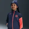 Nike Maskinstrikket FC Barcelona Academy Pro Third Nike Dri-FIT Total 90-fodboldtræningsjakke til større børn - blå