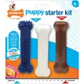 Nylabone Puppy Starterkit tyggeben i nylon til hvalpe (kyllingesmag)