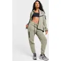Nike Sportswear Tech Fleece-joggers med mellemhøj talje til kvinder - grøn
