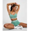 Nike Justerbar Nike Indy-sports-bh med indlæg og let støtte til kvinder - grøn