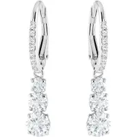 Swarovski Stilla Attract Trilogy dr?begennemborede ?reringe med hvide krystaller p? en rhodineret indstilling med h?ngslet lukning