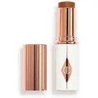 Charlotte Tilbury - Unreal Skin Sheer Glow Tint - Fugtgivende Foundation Stick - Unreal Skin 14 Deep - For Women