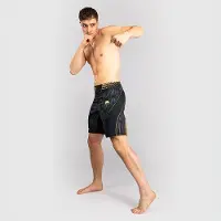 Venum UFC Zenith by Fight Night Fightshorts Lang model Sort Guld
